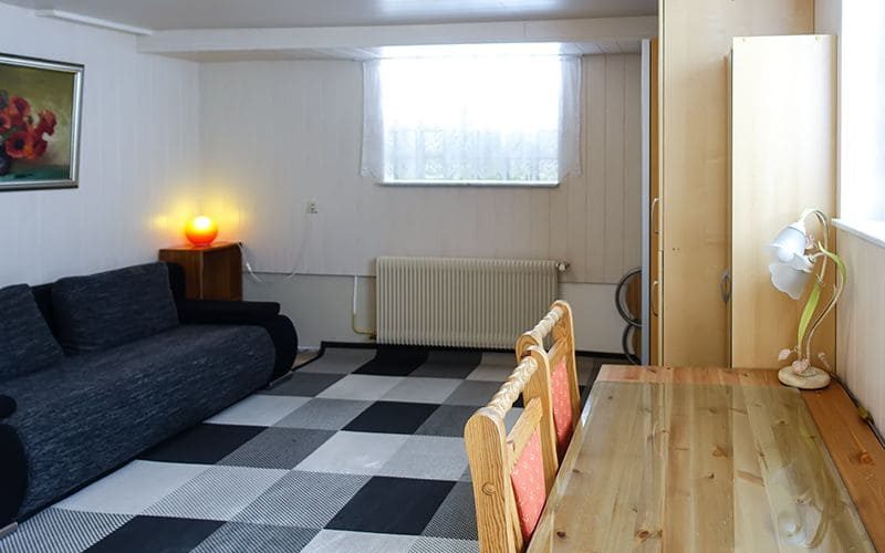 Idyllisch und zentrumsnah gelegene Eigentumswohnung mit Einliegerwohnung, Süd-Terrasse und Garten